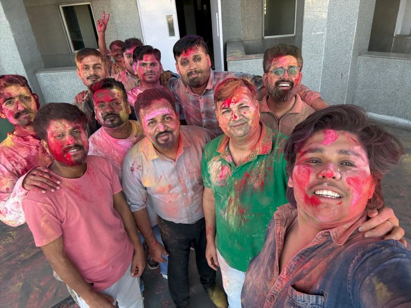 Celebrating the vibrant spirit of Holi with our amazing team!